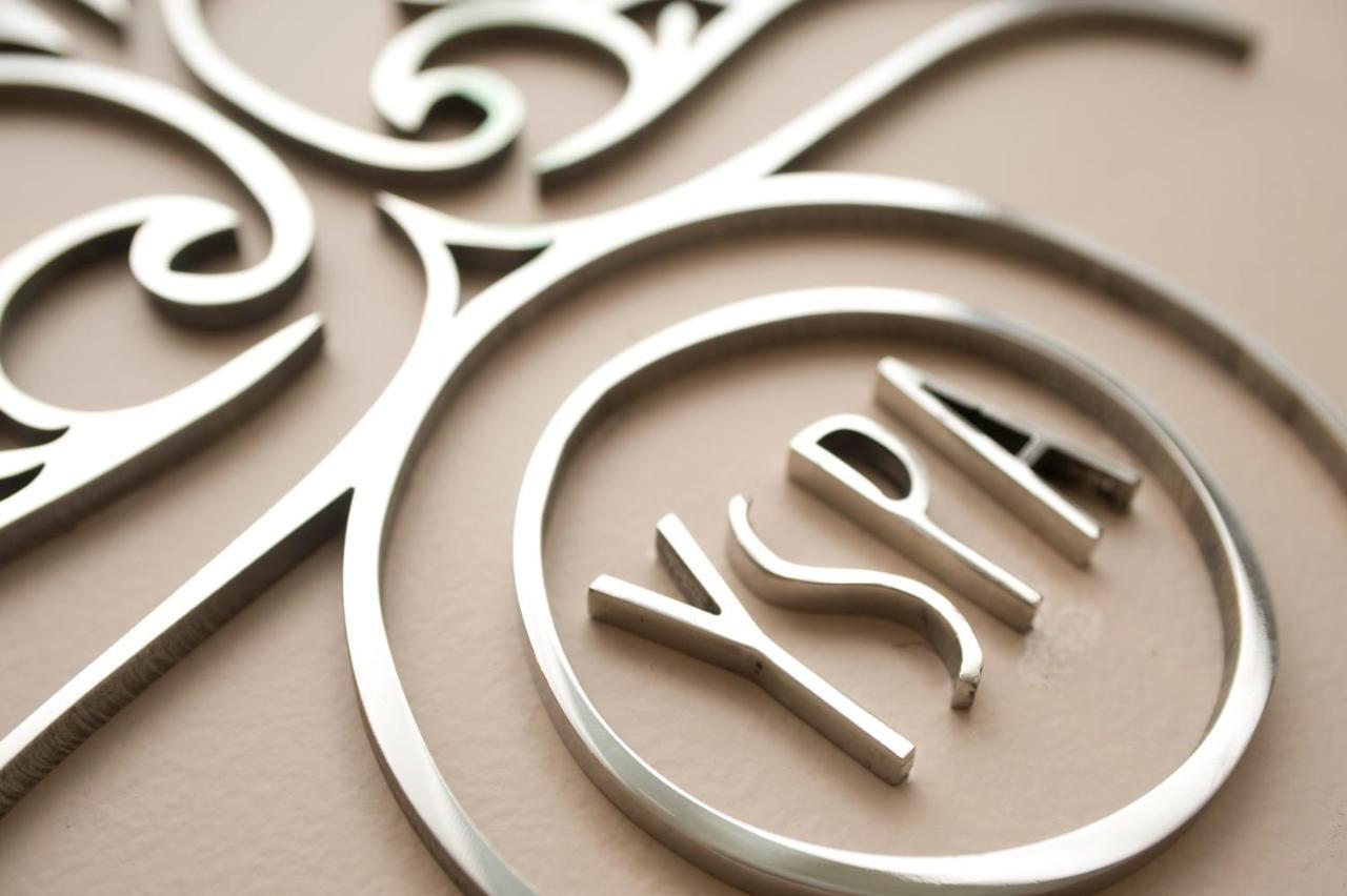 Grand Hotel Yerevan - Small Luxury Hotels Of The World Kültér fotó YSL logo